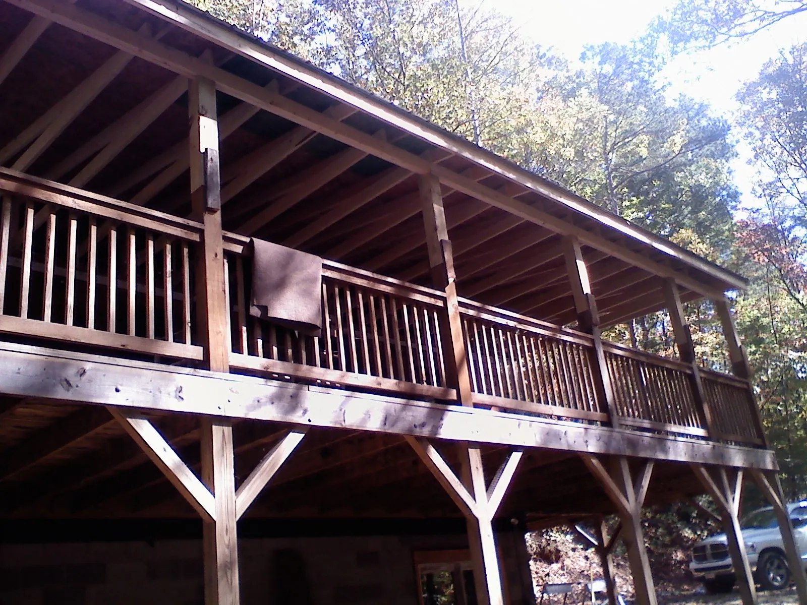 Timber framing under a new elevated porch and deck — Roof Leak Repair in Honey Creek by Roofing Brothers